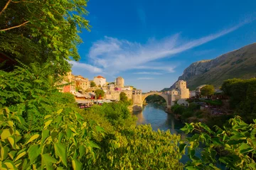 Cercles muraux Stari Most Fantastic Skyline of Mostar with the Mostar Bridge, houses and minarets, during sunny day. Location: Mostar, Old Town, Bosnia and Herzegovina, Europe