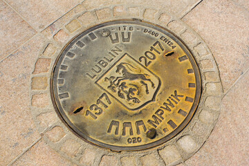 Sewer hatch with goat in Lublin - obrazy, fototapety, plakaty