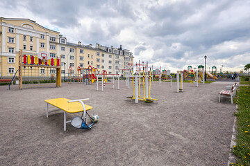 Fototapeta na wymiar Photograph of a playground in greenery in summer