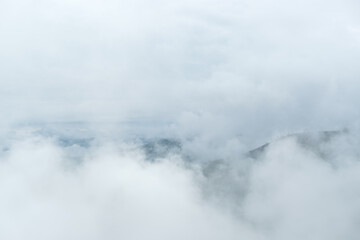 Naklejka na ściany i meble morning fog clouds on the mountain