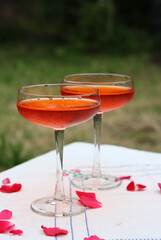 Beautiful cocktail glass with spritz on a table. Summer food and drinks concept. 