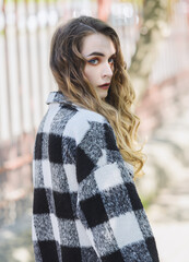 Portrait of young beautiful woman. Natural light. Shallow depth of field.