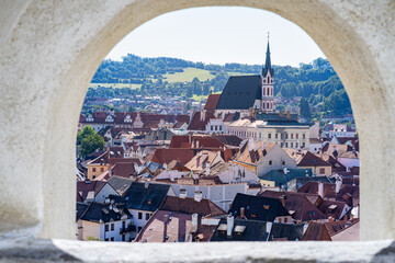Townscape of Cesky Krumlov (Czech Republic) seen from a window opening in 