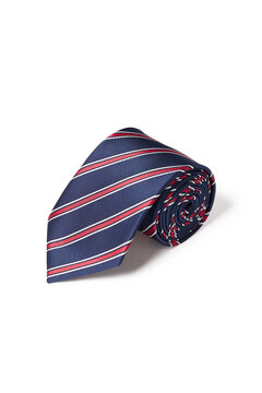 Close-up shot of an elegant blue tie with red and white stripes. The navy blue and red striped tie is rolled and isolated on a white background. Top view.