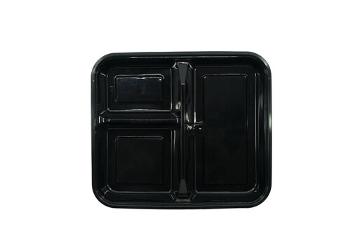 Top view black plastic food box, empty takeaway food container with three-compartments separated, large, middle and small, isolated plastic takeaway lunch box on white background.