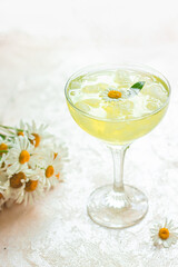 Refreshing chamomile drink. Very narrow focus, the center of the drink in focus.