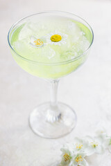 Refreshing chamomile drink. Very narrow focus, the center of the drink in focus.