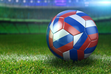 Fototapeta na wymiar Russian Soccer Ball on Stadium Green Grasses at Night