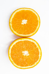orange fruit slices isolated on white background.top view
