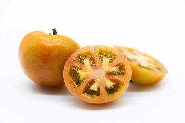 organic tomatoes isolated on white background.