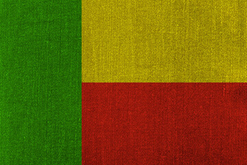 Patriotic classic denim background in colors of national flag. Benin
