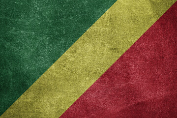 Old leather shabby background in colors of national flag. Congo