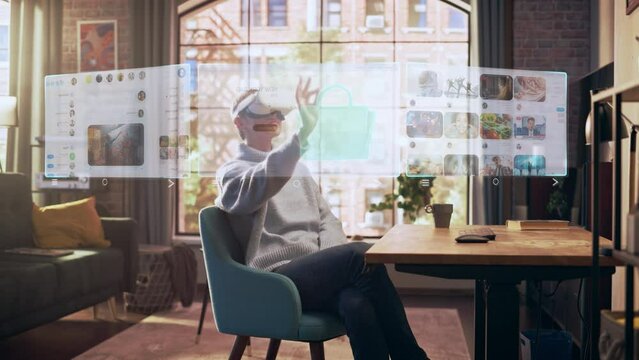 Young Female Sitting in Living Room at Home, Using Virtual Reality Headset with eCommerce Online Shop Application. Successful Woman Choosing to Buy a Luxury Designer Handbag.