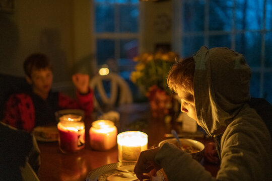 Children eating meal in power outage 