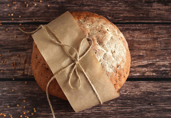 round buckwheat bread on a wooden background
