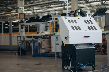 Factory for aluminum and PVC windows and doors production. Details industrial equipment. Background