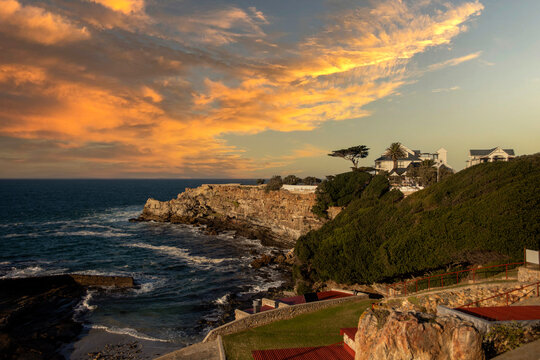 Beautiful photo and scenery of a sunset from the South African town of Hermanus in the Atlantic Ocean, one of the best places in the world to see whales.