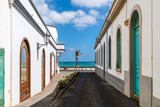 Traditional street with whitewashed houses and colorful windows and doors in Arrecife, Lanzarote, Canary Islands, Spain