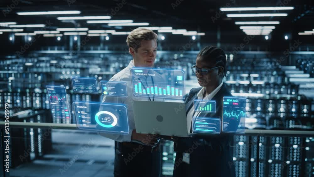 Poster Technical Engineer and Project Administrator Using Computer in Modern Data Center Server Room Facility. Augmented Reality Productivity and Corporate Business Data Icons Appear From Worker's Laptop.