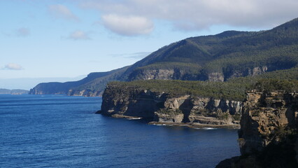 View of Cape Raoul from the boat on the Three Capes Track walk in Tasmania