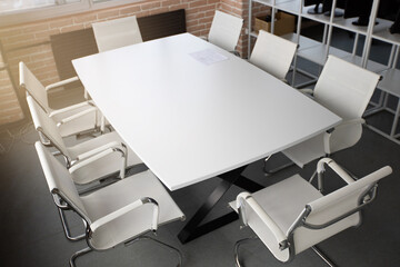 Fototapeta na wymiar stylish table with chairs for business meetings in the office