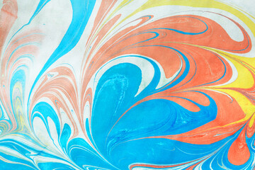 Abstract multicolored drawing with paints on the water. Abstract background.