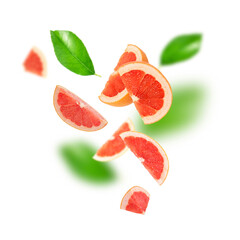 Grapefruit composition with green leaves on a white background.