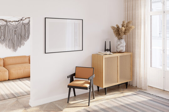 Room with a blank horizontal poster near the doorway to a room with a macrame over a modern sofa, with a chair, spikelets in a vase on a wooden chest of drawers near the door on the balcony. 3d render