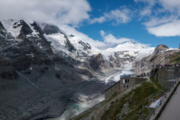 Mountain landscape with snow-capped peaks and blue sky