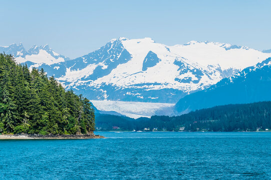 A view past a Cape in Auke Bay on the outskirts of Juneau, Alaska in summertime