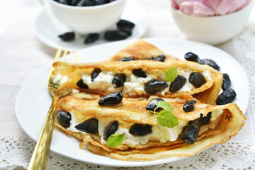 Homemade pancakes with cottage cheese and honeysuckle berries