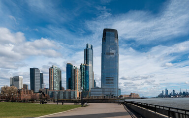 Jersey City skyline at sunny day from New York Skyline Observation Deck. High-quality photo - obrazy, fototapety, plakaty