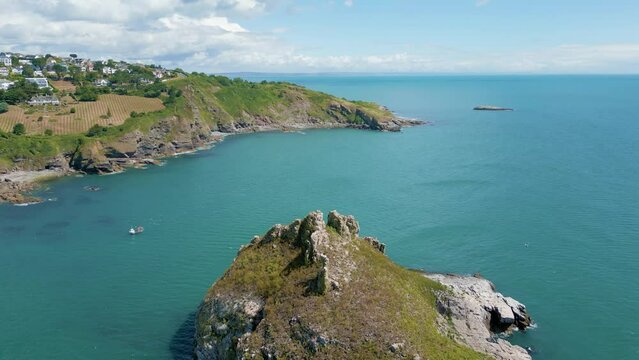 Flying over Thatcher Rock, a small island in Torquay, Devon