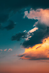 Fototapeta na wymiar Beautiful evening sky with multi-colored bright clouds. Rain clouds at sunset. High-quality photo