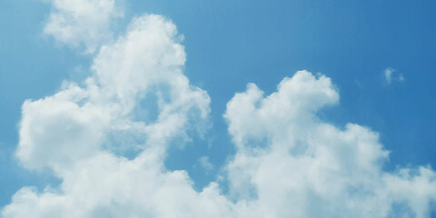 Natural sky beautiful blue and white texture background. furry clouds on a blue sky on a beautiful summer. Clear blue sky with glowing white cumulus clouds after the storm. Dramatic sunset cloudscape.