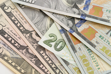 American dollar and Turkish Lira side by side on white background.