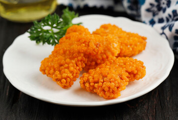 hicken Nugget with Taiwan Crispy Flour, Served on White Plate, on Wooden Table