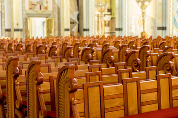 The pews in the church.Sanctuary of Our Lady of Sorrows in Licheń, Queen of Poland. The largest temple in Poland.