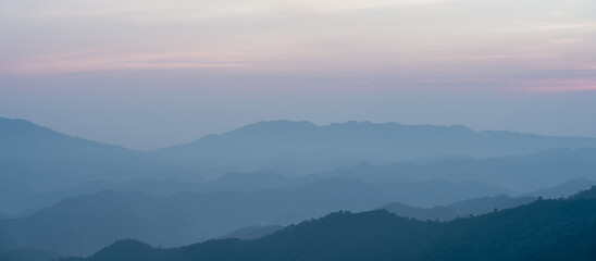 panorama view  layer of mountain with sunrise background