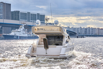 Luxury private motor yacht sailing in the river