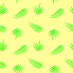 This is a seamless pattern with tropical leaves on a yellow background