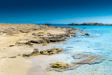 Amazing crystal clear water of Manganari beach, Ios Island,  Greece