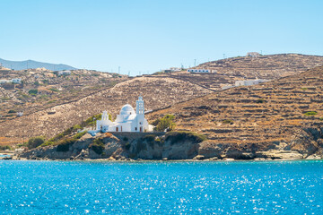 White church on a cliff over the Aegean Sea in Sikinos Island,  Greece