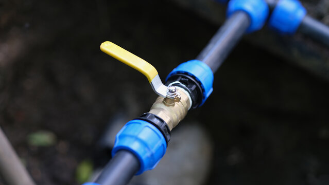 Closeup of pvc pipes with tap or faucet