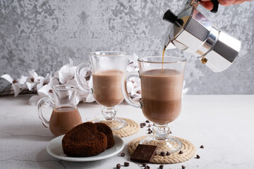 Preparation of lattes from chocolate oat milk and natural coffee with dessert.