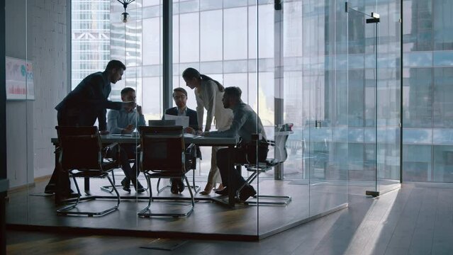 Young business people telling to CEO development vision at a meeting