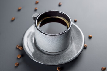 coffee americano on cup on grey table
