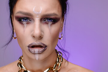 Stylish creative youth Halloween costume. Modern face art. Masquerade disco. Purple violet...