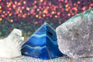 Blue violet pyramid of agate with quartz inclusions or worked as a disc