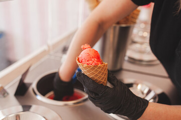 Process of making ice cream. Professional ice cream dessert making in cafeteria. Ice cream...